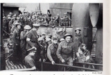 BEF troops disembark from a destroyer at Dover.