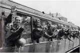 ‘Dunkirk special’ with waving BEF troops passes through Wandsworth Road station.